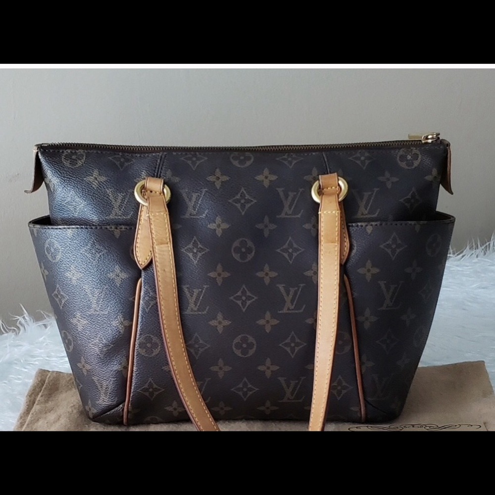 LOUIS VUITTON’S Coveted Monogram “Totally PM”. . .